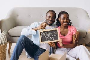 happy-african-american-couple-holding-moving-day-s-2025-05-21-17-02-52-utc (1) (1)